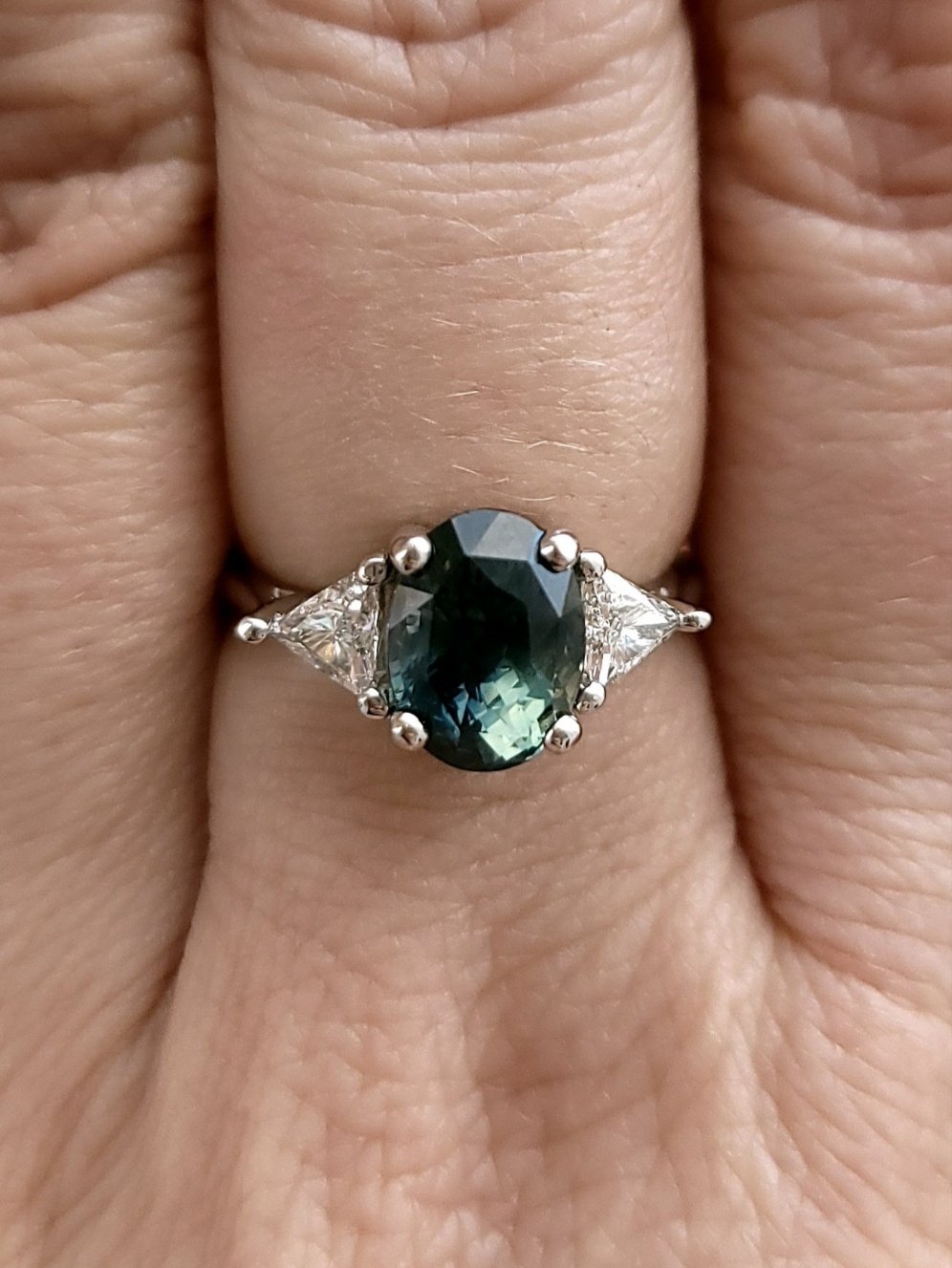 Ring - Madagascar Sapphire 3.26 CT Color Change Oval Cut Teal to Forest Green set in 14K White Gold and Triangle Diamond Ring