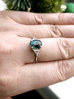 Load image into Gallery viewer, Ring - Madagascar Sapphire 3.26 CT Color Change Oval Cut Teal to Forest Green set in 14K White Gold and Triangle Diamond Ring

