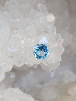 Load image into Gallery viewer, Blue Topaz 1.02 CT Light to Medium Blue Round Cut
