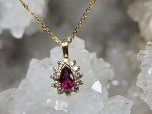 Necklace - Ruby Pendant in 12 Diamond Halo Setting