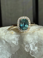 Load image into Gallery viewer, Montana Sapphire and Diamond Halo Ring 14KY
