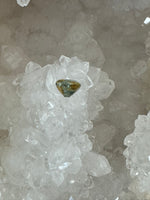 Load image into Gallery viewer, Montana Sapphire 1.55 Carat Silver Blue Green and Gold Edges Oval Cut
