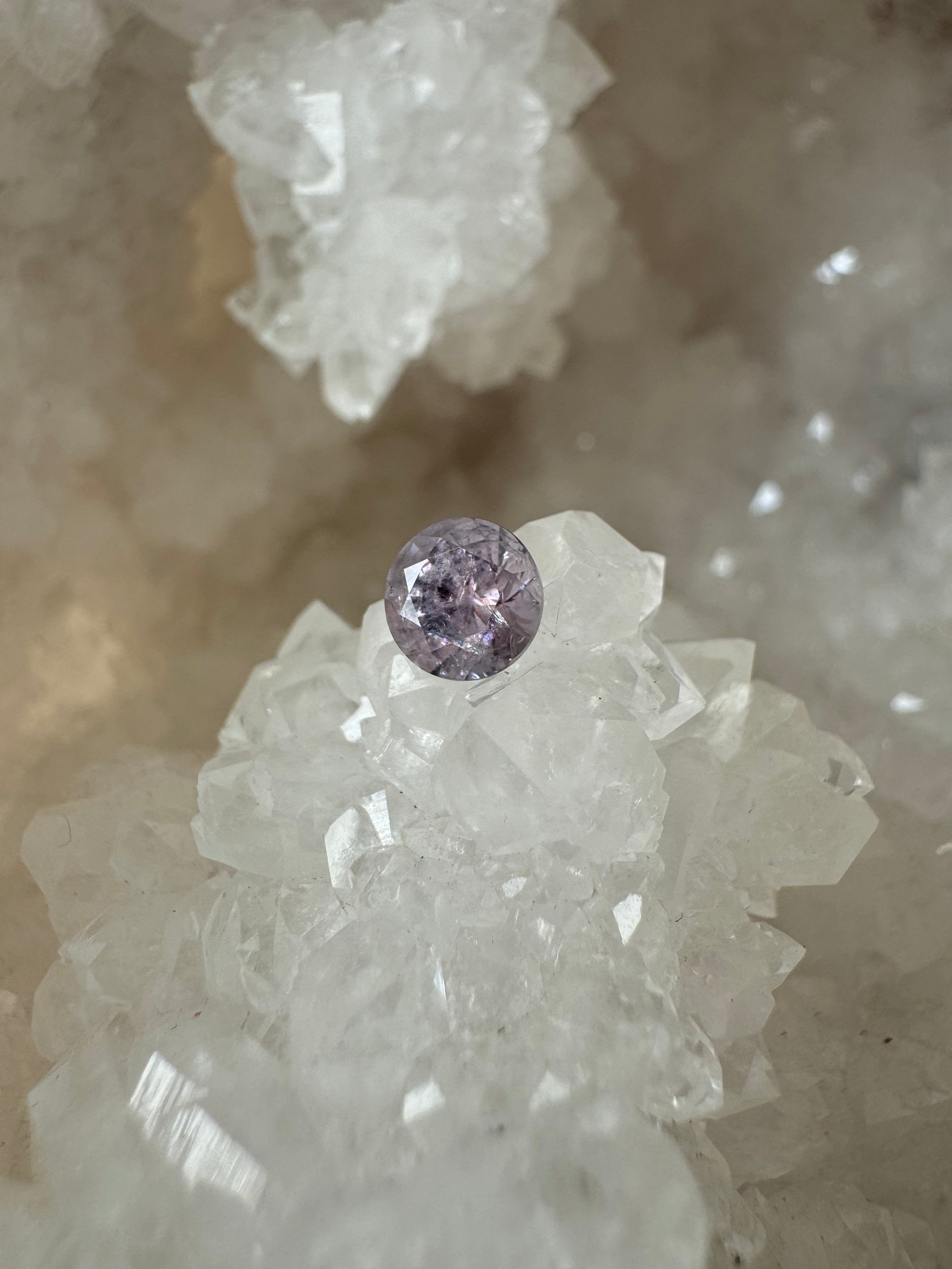 Montana Sapphire 1.26 Carat Galactic Rainbow Inclusion Color Shift Pale to Deep Pink Round Brilliant