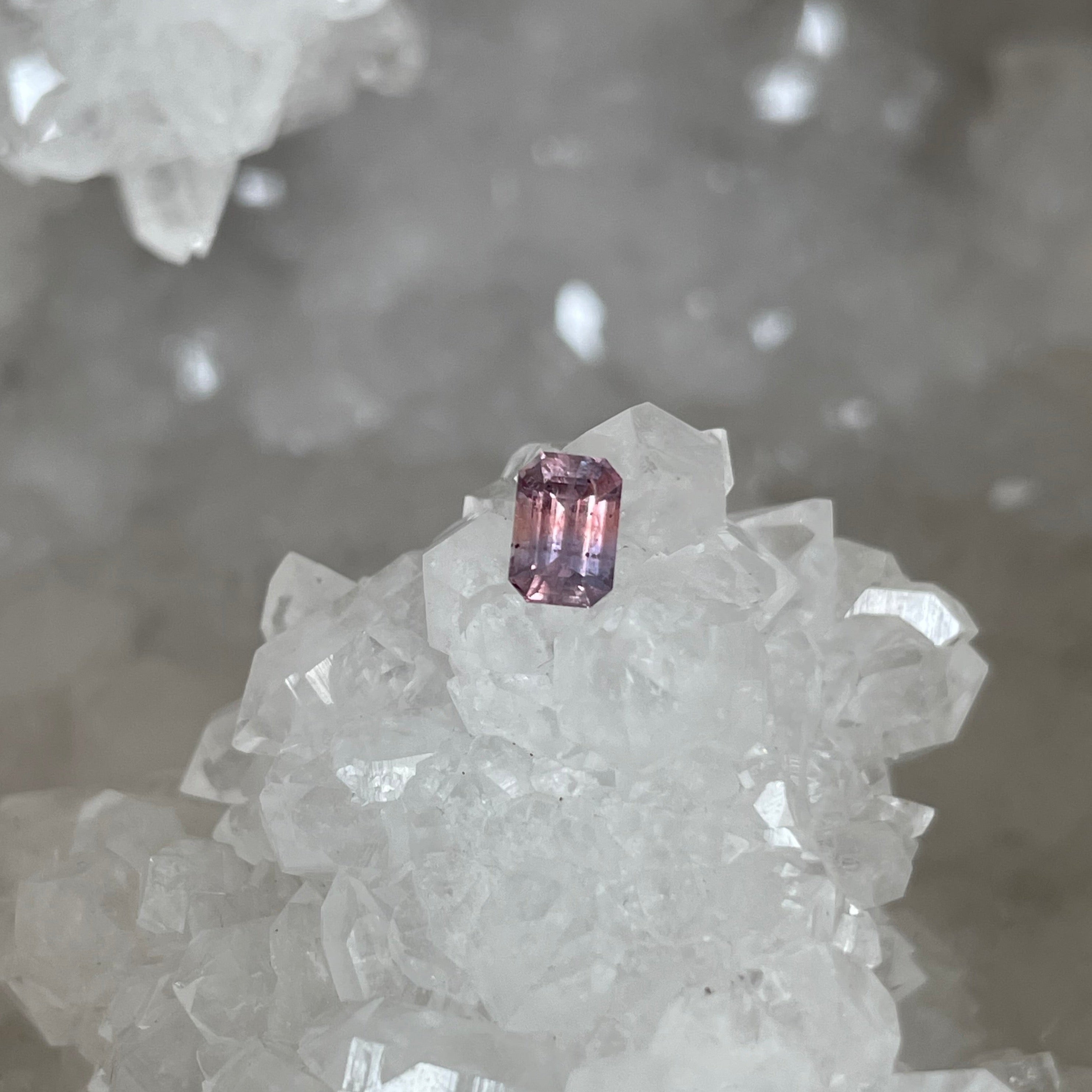 Montana Sapphire .56 CT Pink and Purple to Padparascha and Purple Color Change Emerald Cut