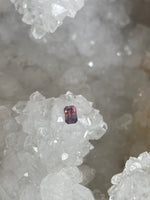 Load image into Gallery viewer, Montana Sapphire .56 CT Pink and Purple to Padparascha and Purple Color Change Emerald Cut
