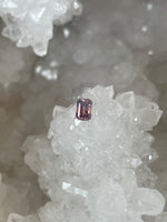Load image into Gallery viewer, Montana Sapphire .56 CT Pink and Purple to Padparascha and Purple Color Change Emerald Cut
