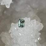 Load image into Gallery viewer, Montana Sapphire 1.44 CT Light Seafoam to Sage Emerald Cut
