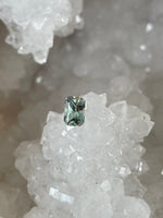 Load image into Gallery viewer, Montana Sapphire 1.44 CT Light Seafoam to Sage Emerald Cut
