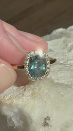 Load and play video in Gallery viewer, Montana Sapphire and Diamond Halo Ring 14KY
