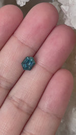 Load and play video in Gallery viewer, Montana Sapphire 1.58 CT Stormy Blue Green Stretched Hexagon Cut
