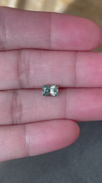 Load and play video in Gallery viewer, Montana Sapphire 1.44 CT Light Seafoam to Sage Emerald Cut
