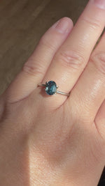 Load and play video in Gallery viewer, Montana Sapphire 1.50 Carat Deep Teal Oval Cut
