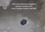 Load and play video in Gallery viewer, Montana Sapphire 1.08 CT Teal Purple Color Change Antique Cushion Cut
