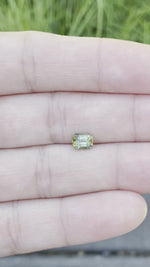 Load and play video in Gallery viewer, Montana Sapphire 1.00 CT Teal with Orange Radiant Emerald Cut
