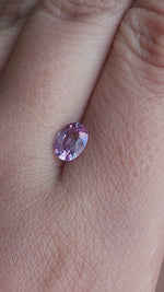 Load and play video in Gallery viewer, Spinel .93 CT Lavender Pink Oval Cut

