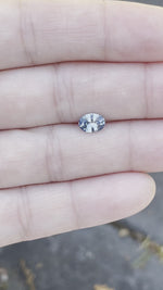 Load and play video in Gallery viewer, Montana Sapphire .99 CT Blue White Yellow Oval Cut
