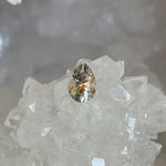 Load image into Gallery viewer, Montana Sapphire .86 CT Color Change Orange Peach Silver Pear Cut
