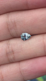 Load and play video in Gallery viewer, Montana Sapphire .87 CT Greyish Blue Geo Pear Cut
