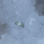 Load image into Gallery viewer, Montana Sapphire .78 CT Sea-foam Green, Grey, Silver Half Moon Cut
