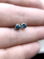 Load image into Gallery viewer, Earrings - Montana Sapphire .89 CTW ODD COUPLE Blue/Blue-Green ODD Round Cuts in 14k Yellow Gold Post
