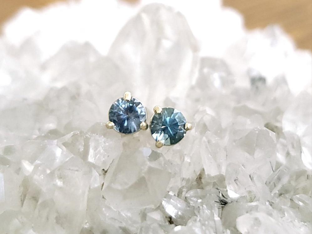 Earrings - Montana Sapphire .89 CTW ODD COUPLE Blue/Blue-Green ODD Round Cuts in 14k Yellow Gold Post