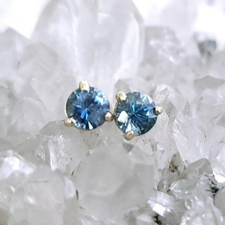 Earrings - Montana Sapphire .89 CTW ODD COUPLE Blue/Blue-Green ODD Round Cuts in 14k Yellow Gold Post