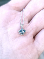 Load image into Gallery viewer, Pendant - Montana Sapphire .74 CT Teal Checkerboard Round Cut set in 14k White Gold Diamond Solitaire Flower
