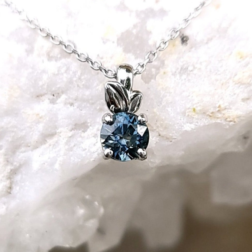 Pendant - Montana Sapphire .52 CT Cornflower Blue Round Cut set in 14K White Gold Solitaire with Leaf Details