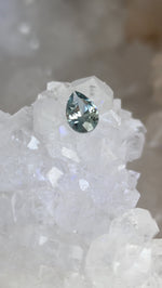 Load image into Gallery viewer, Montana Sapphire .81 CT Light Blue Green Yellow Pear Cut
