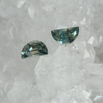 Load image into Gallery viewer, Montana Sapphire .97 CTW Bluish Green Half Moon Cut - Matched Pair
