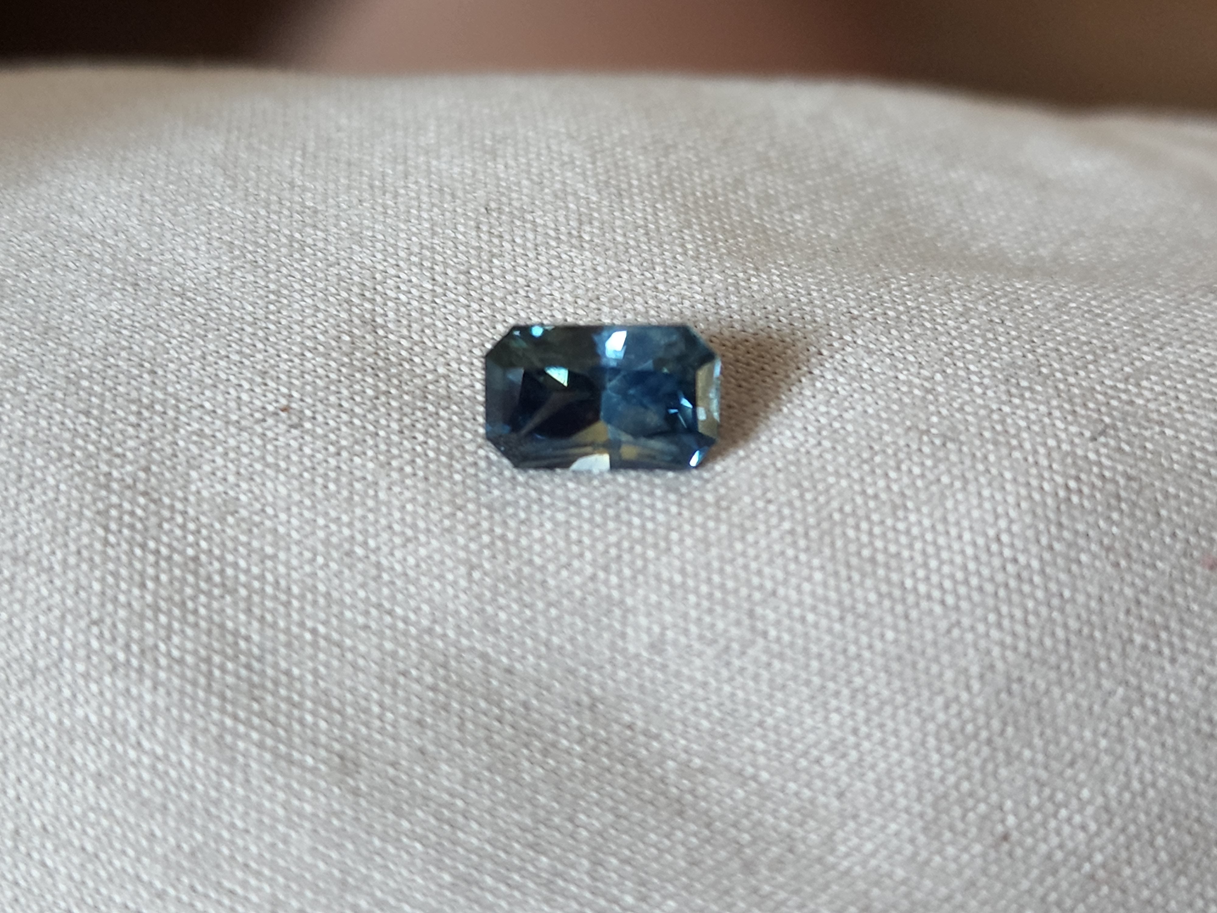 Montana Sapphire .91 CT Bluish Teal with Grey Scissor Cut