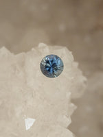 Load image into Gallery viewer, Montana Sapphire .91 CT Light to Medium Blue Round Cut
