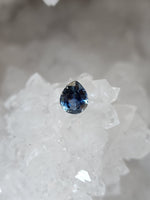 Load image into Gallery viewer, Montana Sapphire .94 CT Dark Blue Heart with Silver Edges Pear Cut
