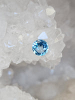 Load image into Gallery viewer, Blue Topaz 1.02 CT Light to Medium Blue Round Cut
