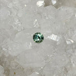 Load image into Gallery viewer, Montana Sapphire .31 CT Teal Round Cut
