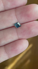 Load and play video in Gallery viewer, Montana Sapphire .74 CT Blue Teal Color Shift Lozenge Cut
