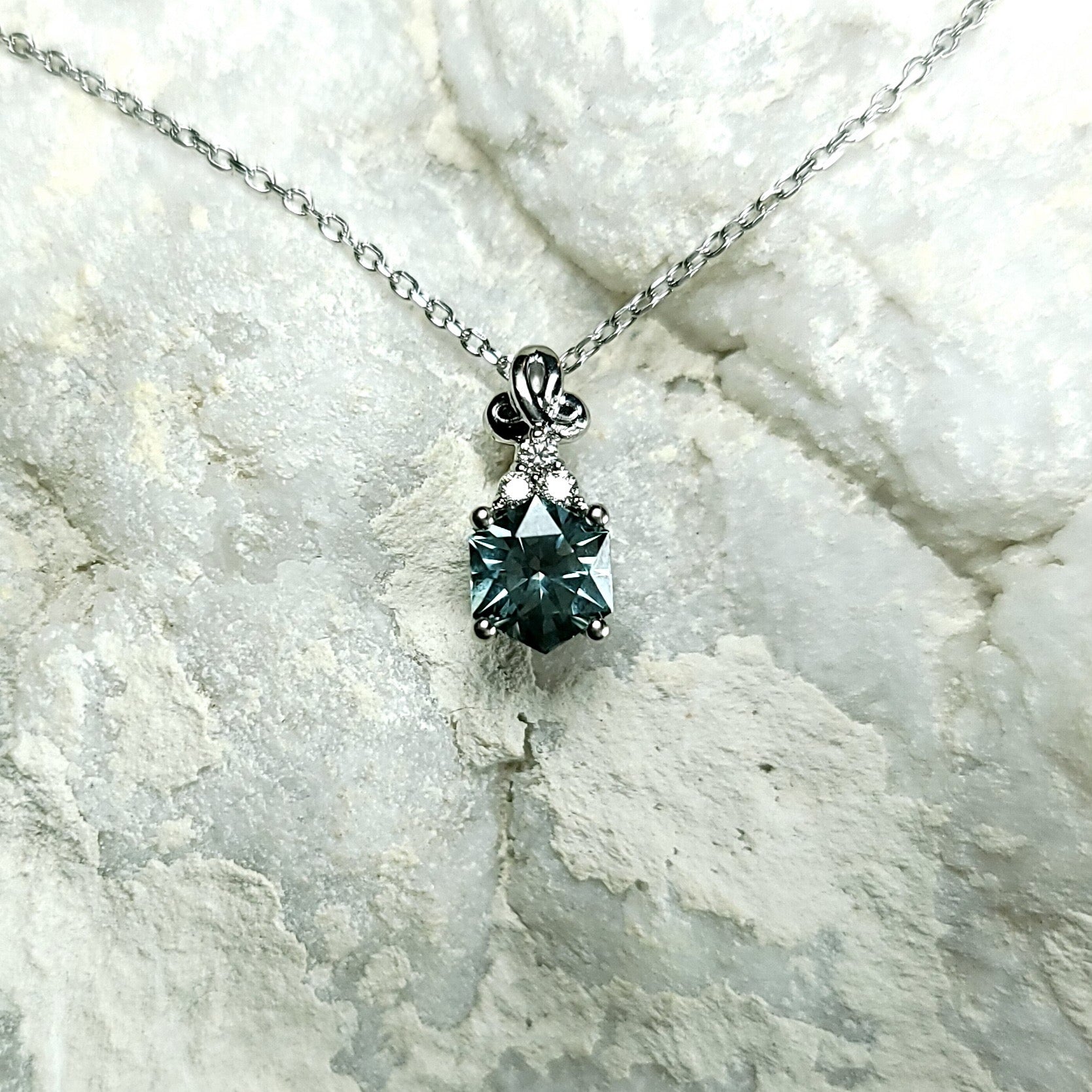 Pendant - Montana Sapphire 1.05 CT Deep Teal Hexagon Cut and set with accent Diamond in 14k White Gold