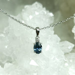 Load image into Gallery viewer, Pendant - Montana Sapphire .61 CT Blue Oval with Accent Diamond in 14k White Gold
