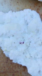 Load image into Gallery viewer, Montana Sapphire .33 CT Pink, Lilac, Lavender, Mauve Half Moon Cut
