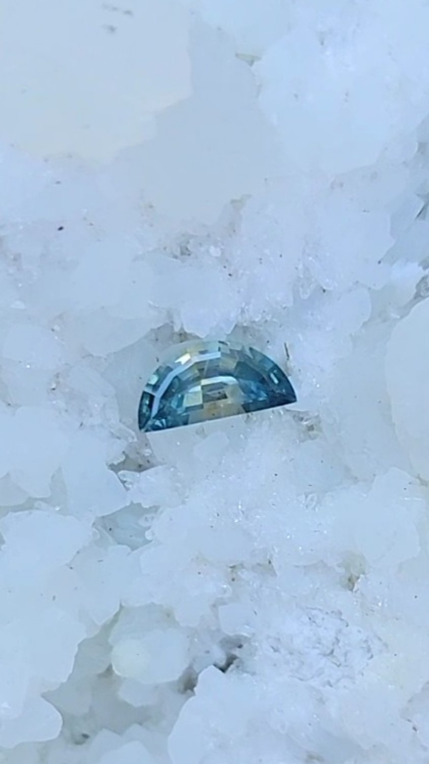 Montana Sapphire .46 CT Blue, Teal, Peach Half Moon Cut