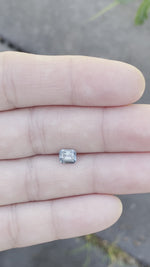 Load and play video in Gallery viewer, Montana Sapphire 1.15 CT Blue Grey Emerald Cut
