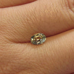 Load image into Gallery viewer, Montana Sapphire Very Light Yellow Oval cut .90 carat
