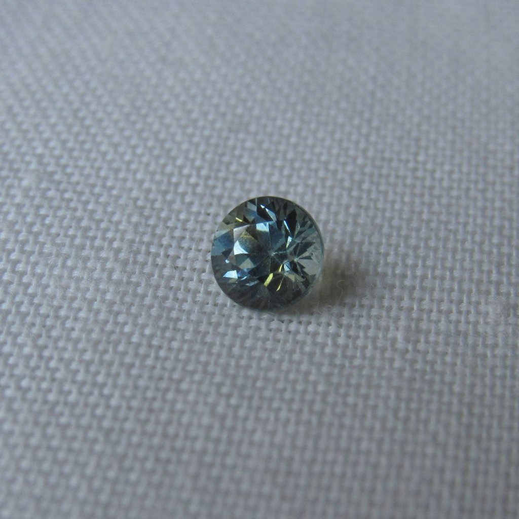 Montana Sapphire .70 CT Blue and Yellow Round Brilliant Cut