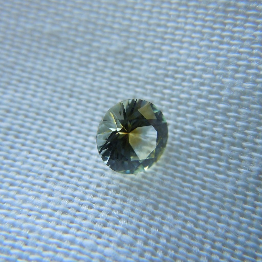 Montana Sapphire .60 CT White and Yellow Round Brilliant Cut