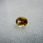 Load image into Gallery viewer, Montana Sapphire .47 CT Yellow Orange Oval Cut
