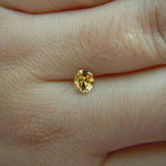 Load image into Gallery viewer, Montana Sapphire .47 CT Yellow Orange Oval Cut
