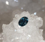 Load image into Gallery viewer, Montana Sapphire .99 CT Dark Blue with Grey, Green Oval Cut
