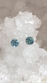 Load image into Gallery viewer, Montana Sapphire 1.84 CTW Color Change Teal Blue Sea-Foam Periwinkle Green Gray Yellow Peach Round Cut - Oddly Paired
