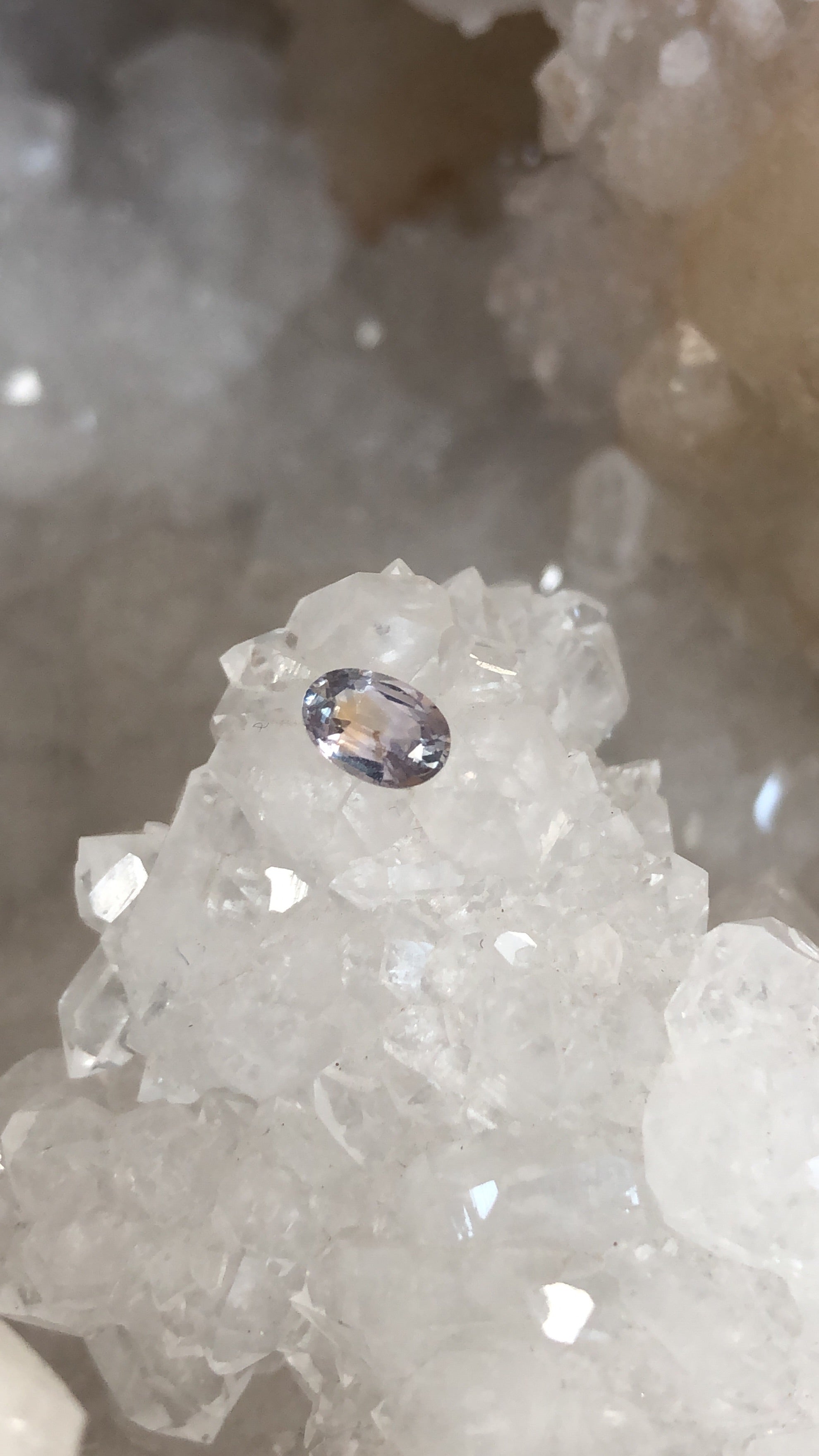 Montana Sapphire .64 CT Silver with Peach and Lavender Oval Cut