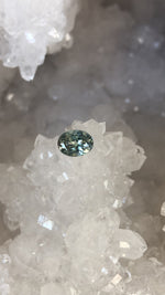 Load image into Gallery viewer, Montana Sapphire 1.75 CT Very Light Blue Green Oval Cut

